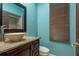 Stylish bathroom featuring a vessel sink, granite countertops, and a tiled shower at 800 Belted Kingfisher S Dr, Palm Harbor, FL 34683