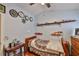 This bedroom has a ceiling fan, hardwood floors and shelves to display collectable toy vehicles at 8916 Southbay Dr, Tampa, FL 33615