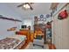 This bedroom has a ceiling fan, decor and lots of shelf space to display toys and trinkets at 8916 Southbay Dr, Tampa, FL 33615