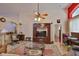 Cozy living area featuring classic decor and traditional furniture, creating a warm and inviting atmosphere at 8916 Southbay Dr, Tampa, FL 33615