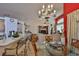 Spacious living room with open floor plan, seamlessly connecting to the dining area at 8916 Southbay Dr, Tampa, FL 33615