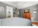 Cozy bedroom with ensuite bathroom and ample natural light at 1003 W Indiana Ave, Tampa, FL 33603