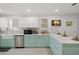 Beautiful kitchen featuring stainless steel appliances and ample counter space at 1003 W Indiana Ave, Tampa, FL 33603