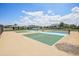 Community pickleball courts with blue and green surfaces and black fencing for recreational enjoyment at 10111 Tuscan Sun Ave, Riverview, FL 33578