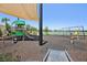 Community playground featuring slides, swings, and a covered area, perfect for outdoor activities at 10111 Tuscan Sun Ave, Riverview, FL 33578