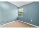 Bedroom with neutral carpeting, pale blue walls, and natural light at 10511 Waterview Ct # 10511, Tampa, FL 33615