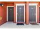 Close-up of condo entrance doors with unit numbers and welcome mats at 10511 Waterview Ct # 10511, Tampa, FL 33615