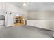 Spacious living room open to the kitchen with stainless steel appliances at 10511 Waterview Ct # 10511, Tampa, FL 33615