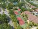 Aerial view of community tennis courts and lush trees at 10511 Waterview Ct # 10511, Tampa, FL 33615