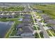Aerial view of the community showcasing the neighborhood layout and various home exteriors at 11684 Brighton Knoll Loop, Riverview, FL 33579