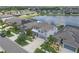 Spacious home with green lawn, community lake access, and neighborhood views from above at 11684 Brighton Knoll Loop, Riverview, FL 33579