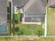 Aerial backyard view features lush lawn, enclosed patio, landscaping and fencing at 11684 Brighton Knoll Loop, Riverview, FL 33579