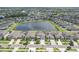 Beautiful aerial view of the homes in the community with an adjacent lake at 11684 Brighton Knoll Loop, Riverview, FL 33579