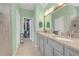 Bathroom with granite countertops and a walk-in closet at 11684 Brighton Knoll Loop, Riverview, FL 33579