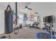 Bright, well-equipped home gym with motivational decor and ample natural light at 11684 Brighton Knoll Loop, Riverview, FL 33579