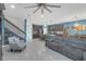View of open floorplan with staircase, living room and kitchen at 11684 Brighton Knoll Loop, Riverview, FL 33579