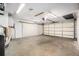 Spacious garage with concrete floor and drywall ready for storage and projects at 12019 106Th Ct, Largo, FL 33778