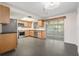 Modern kitchen with stainless steel appliances, ample cabinetry, and dark countertops at 12019 106Th Ct, Largo, FL 33778