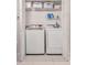 Functional laundry room with modern washer and dryer units at 1230 S Missouri Ave # 704, Clearwater, FL 33756