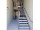 Exterior staircase providing access to upper-level units at 1230 S Missouri Ave # 704, Clearwater, FL 33756