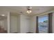A bright bedroom featuring neutral tones, and a large window at 1246 Ocean Reef Rd, Wesley Chapel, FL 33544