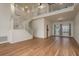 Hardwood flooring throughout the living area that leads up to the second floor at 1246 Ocean Reef Rd, Wesley Chapel, FL 33544