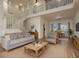 Open living area with stairs to 2nd floor provides a spacious feel at 1246 Ocean Reef Rd, Wesley Chapel, FL 33544