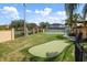Community recreation area featuring a putting green, basketball court, and well-manicured landscaping at 1246 Ocean Reef Rd, Wesley Chapel, FL 33544