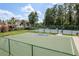 Community soccer field and tennis courts, offering recreational activities within a secure fenced area at 1246 Ocean Reef Rd, Wesley Chapel, FL 33544