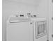 Bright laundry room with modern washer and dryer at 135 Commonwealth N Ct, St Petersburg, FL 33716