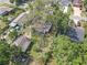 Aerial view of property showcasing its location in an established residential neighborhood at 1506 E Poinsettia Ave, Tampa, FL 33612