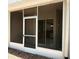 Screened patio provides outdoor space and adjoins a glimpse of the kitchen through the door at 15922 Fishhawk Creek Ln, Lithia, FL 33547