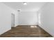 Bright bedroom features recessed lighting and attractive wood-look vinyl flooring at 16247 Little Auk Rd, Weeki Wachee, FL 34614
