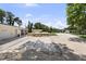 Wide driveway showing a large modern home with a three-car garage at 16315 Lonely Ln, Odessa, FL 33556