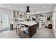 Well-appointed kitchen featuring a center island, stainless steel appliances, and an open layout at 16315 Lonely Ln, Odessa, FL 33556