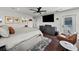 Spacious main bedroom with a view to the pool, featuring an elegant area rug and dark wood floors at 16315 Lonely Ln, Odessa, FL 33556
