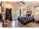 Bedroom with a small balcony and views of the outside at 16603 Hutchison Rd, Odessa, FL 33556