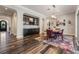 Dining room showcasing built-in bar and decorative painting, flowing seamlessly into the home's layout at 17724 Daisy Farm Dr, Lutz, FL 33559