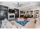 Open-concept living area flows into the modern kitchen, offering a seamless entertaining space at 17724 Daisy Farm Dr, Lutz, FL 33559