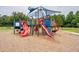 This community playground boasts multiple slides, climbers and areas for exploration for young children at 17724 Daisy Farm Dr, Lutz, FL 33559