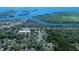 Aerial view of the neighborhood next to the water at 1820 Rumar Ln, Holiday, FL 34691