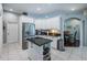 Bright kitchen featuring granite countertops, stainless steel appliances, and a center island at 2143 Edelweiss Loop, Trinity, FL 34655