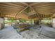 Spacious pavilion interior with picnic tables, ideal for community events and Gathering gatherings at 2143 Edelweiss Loop, Trinity, FL 34655