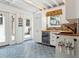 Quaint kitchenette features custom cabinets, a wood countertop, and unique backsplash at 2511 W Morrison Ave, Tampa, FL 33629