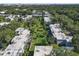 An aerial view of the condo community surrounded by mature trees at 2820 Somerset Park Dr # 101, Tampa, FL 33613