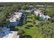 Aerial view of apartment buildings featuring well-maintained landscaping and mature trees offering shade and curb appeal at 2820 Somerset Park Dr # 101, Tampa, FL 33613