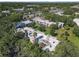 Overhead perspective of the building's structure, green spaces, and proximity to the highway at 2820 Somerset Park Dr # 101, Tampa, FL 33613