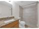 Bathroom featuring a shower and vanity with granite countertop at 2820 Somerset Park Dr # 101, Tampa, FL 33613
