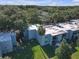 A lovely two-story apartment building with green landscaping and palm trees in a park-like setting at 2820 Somerset Park Dr # 101, Tampa, FL 33613