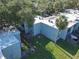 View of an apartment building with well-manicured lawns and privacy fencing; close to the parking lot at 2820 Somerset Park Dr # 101, Tampa, FL 33613